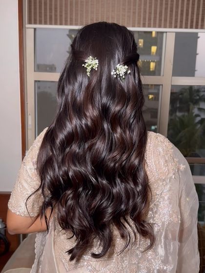 Another shot of the engagement hairstyle, perfect for showing off hair length and texture.