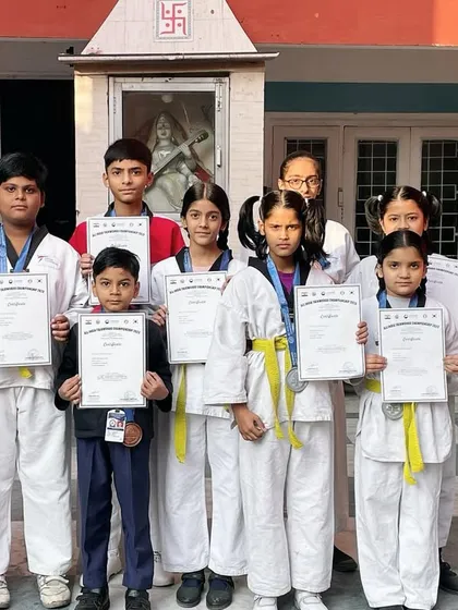 Certificate distribution day at school. We partner with schools to bring Taekwondo training to more children, and it's always great to celebrate their achievements.