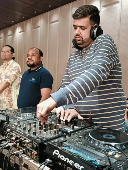 In the mix at a corporate event. You can see the event host Aman Shah's team in the background, ensuring everything runs smoothly.