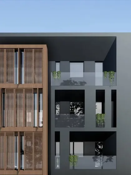 A closer view of the facade's upper levels. The interplay between the open balconies, geometric voids, and the warm texture of the wooden screens was designed to create visual interest while ensuring privacy and light for the residents.