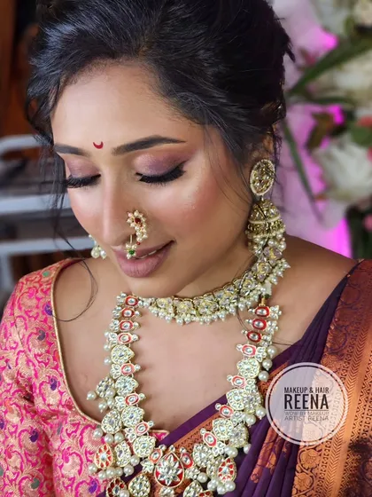 Creating this Marathi look was so much fun. I gave my muse a soft smokey eye with a hint of pink, a classic messy bun, and a traditional nath to complete the vibe.