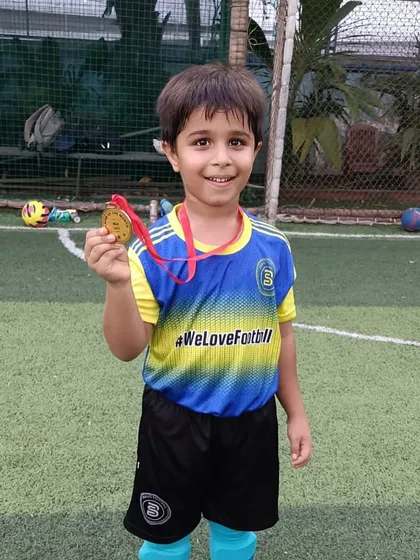 A smile of pride from one of our youngest Player of the Month winners.
