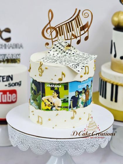 A single-tier cake for Anish Chhabra, decorated with edible photos from his music videos and topped with musical notes.