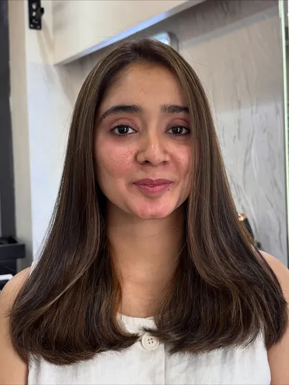 A happy client with her new espresso brown hair. The color is subtle enough for any workplace but still provides that fresh salon feeling and a noticeable glow up.