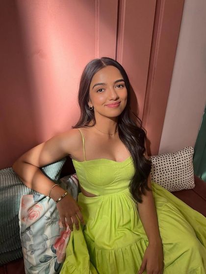 A bright and sunny look for Ahsaas Channa. This lime green cutout dress is perfect for a fresh, summery photoshoot, radiating effortless charm.