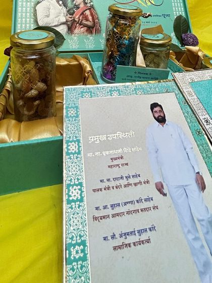 This image shows the invitation inserts for a political dignitary's event, placed inside the elegant hamper. It demonstrates how I can customize these boxes for any type of grand occasion, not just weddings.