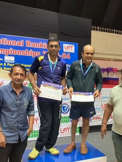 Gajanan Parmar on the podium receiving his silver medal for the doubles event at the 2nd PARA National Rankings.