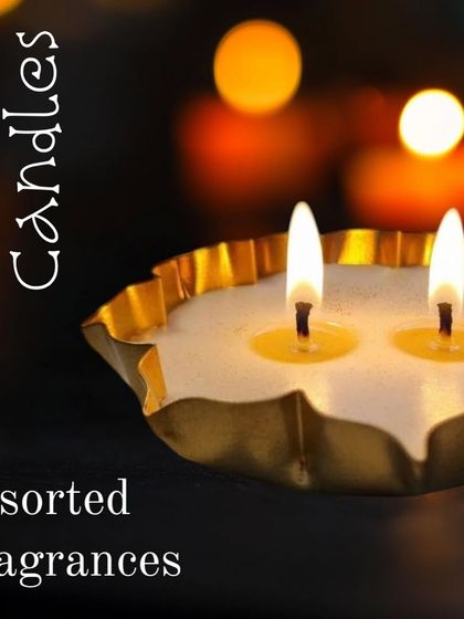 A moody, atmospheric shot of a lit urli candle. These containers are perfect for creating a festive and warm ambiance for Diwali or other celebrations.