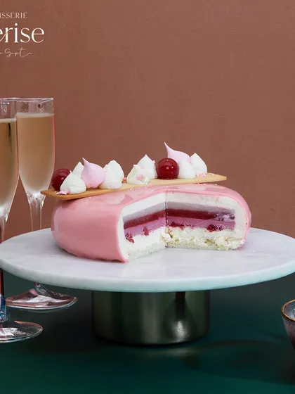 The "Explosion of Berries" pairs wonderfully with a glass of Prosecco. The wine's crispness balances the dessert's sweetness, making it perfect for a celebration.