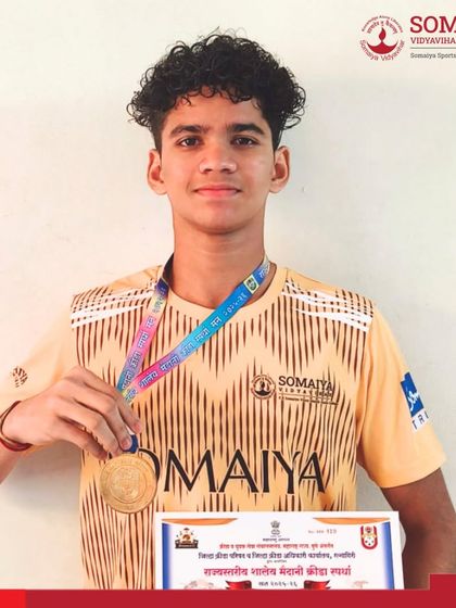 Manas Shinde with his gold medal won in the 400m race at the Maharashtra State School Games Athletics Meet.