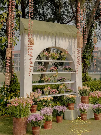 Another angle of the charming bouquet shop photo booth, a perfect spot for guests to take pictures.