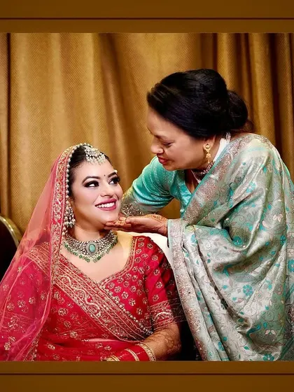 The bond between a mother and her daughter on a wedding day is truly special. We make sure to capture these quiet, emotional interactions amidst the day's celebrations, preserving the heartfelt connection in a timeless portrait.
