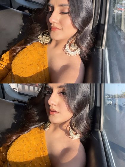 A sunkissed car selfie in my yellow suit. The natural light highlights the intricate work on the outfit and my statement earrings.