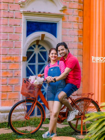 A fun and casual shot with the orange bicycle against our colorful European-style building.