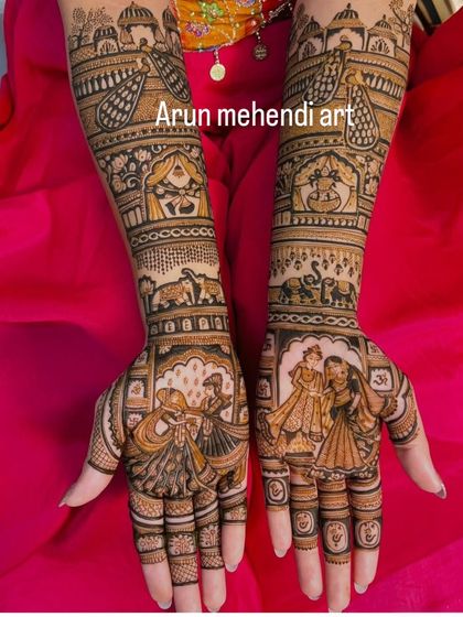 This design captures a playful moment, with figures that look like they are dancing, possibly from a sangeet ceremony.