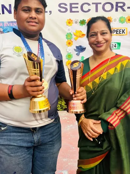 One of my players receiving her trophies from the school principal after a stellar performance.