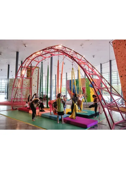 Our studio is a hub of activity. This shot captures the energy of a class in session, with the entire space filled with people moving and learning.