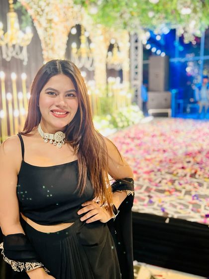 Feeling the vibe on a petal-strewn dance floor at a reception party. The ambiance was magical.