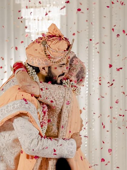 A heartfelt embrace during the wedding ceremony. My goal is to create an emotional and memorable atmosphere that enhances these precious moments.