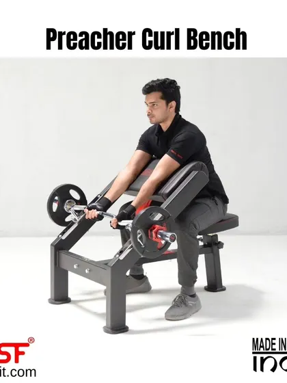 A user getting set up on the Preacher Curl Bench. The adjustable seat ensures perfect alignment for any user.