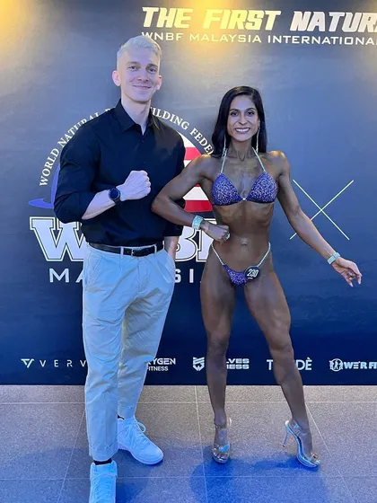 A proud moment with my coach after placing 4th at the WNBF Malaysia competition. His guidance was invaluable in helping me navigate the challenges of an international pro-qualifier show.