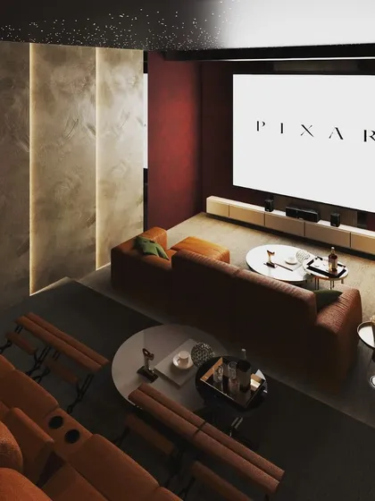 This high-angle render provides a comprehensive view of another home theater layout, featuring both a large sofa and tiered recliner seating. This demonstrates our ability to design versatile entertainment spaces that can accommodate both casual viewing and dedicated movie nights.