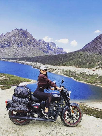 Sometimes you just have to embrace the cliché. Posing with a Royal Enfield at Sela Pass is a classic traveler moment, a fun memory from an incredible bike journey through the mountains of Arunachal.