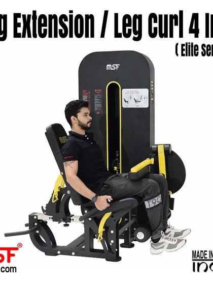 A user on the seated leg extension.