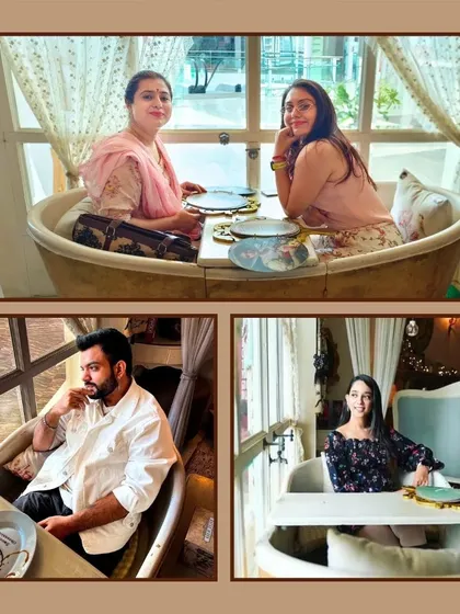 The bathtub dining area isn't just for couples; it's a fun and unique spot for friends too. These photos show different guests enjoying this whimsical corner of the cafe.