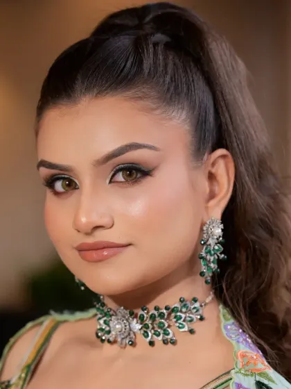 A detailed shot of the modern choker set, featuring a floral design with green beads and diamond-like stones. This piece is versatile enough for both traditional and contemporary outfits.