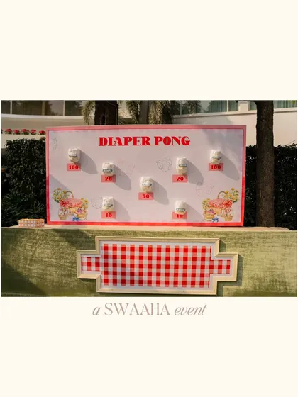 Fun and games for a baby shower, including a "Diaper Pong" station, showing my creativity extends to all types of celebrations.