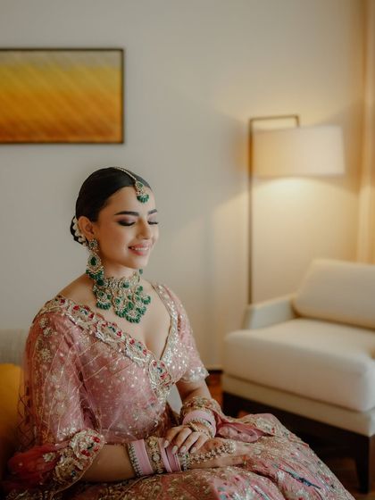 Another happy, relaxed moment. The makeup is soft and pretty, perfect for a daytime wedding ceremony.