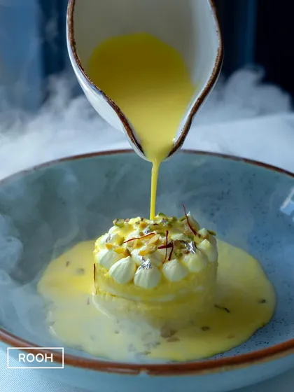 A moment of pure indulgence. Our signature Rasmalai Cheesecake sees creamy cheesecake infused with the delicate flavours of traditional rasmalai, finished with a dramatic pour of saffron milk.