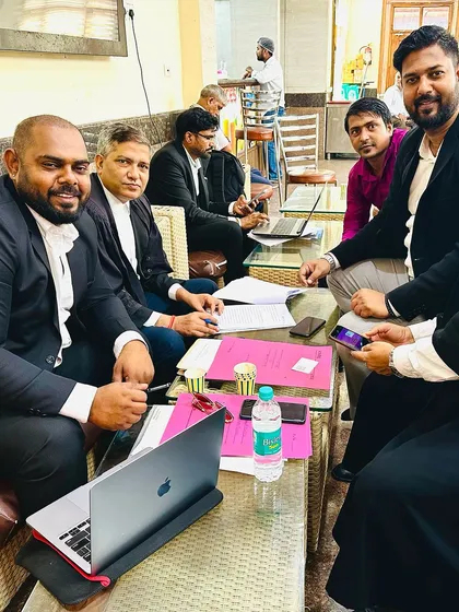 A candid moment during a work session with the team.