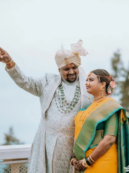 A happy, candid moment between the couple with the beautiful Mussoorie landscape in the background.