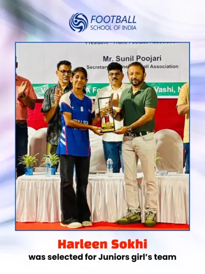 Harleen Sokhi receives her award for being selected to the Juniors girl's team, marking a key step in her football journey.