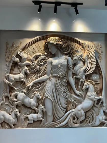 Another angle of the lady with the horses, showing the depth and relief of the sculpture. This is a great example of a custom fibre mural for a living room.