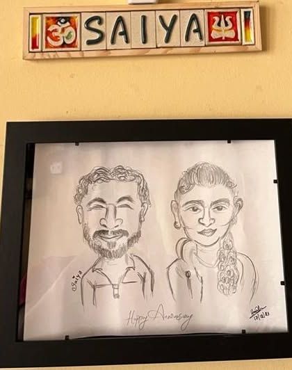 It's priceless to see my art framed and cherished in a client's home. This anniversary caricature found its perfect spot.