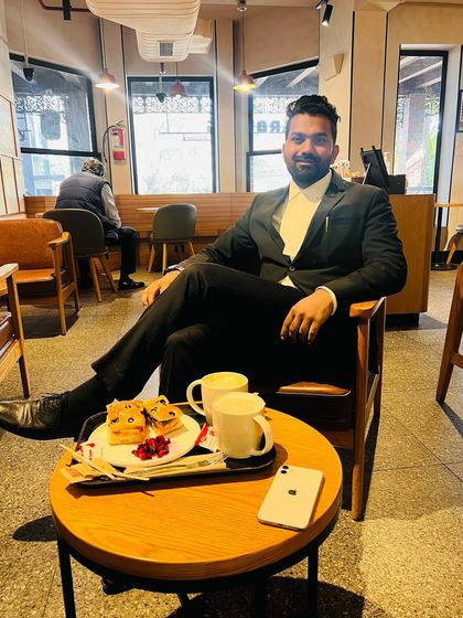 A moment at a cafe. I will always raise my voice for honesty, truth, and compassion against injustice, a core principle of my personal and professional life.