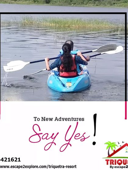 Say yes to new adventures. A couple paddles together, ready to explore what's around the bend.