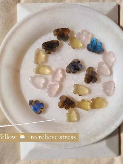 My candy cloud charms, with the yellow lemon quartz pointed out for its ability to relieve stress.