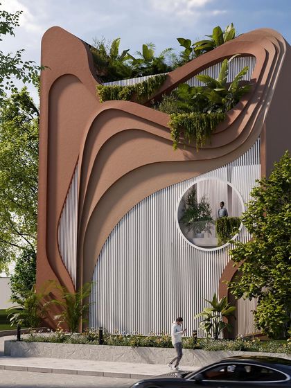 Another angle of the "Water & Wind" facade, showing the interplay of the solid, earthy-toned curves and the vertical white panels.