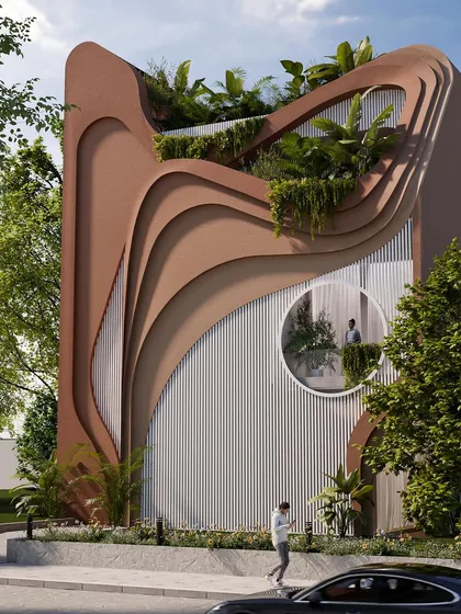 Another angle of the "Water & Wind" facade, showing the interplay of the solid, earthy-toned curves and the vertical white panels.