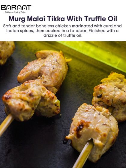 Soft and tender boneless chicken marinated with curd and Indian spices, then cooked in a tandoor and finished with a drizzle of truffle oil for a touch of luxury.