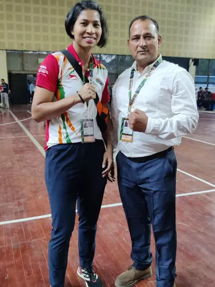 I am proud to have trained and worked with some of India's best boxers. Here I am with Olympian and world champion Lovlina Borgohain.