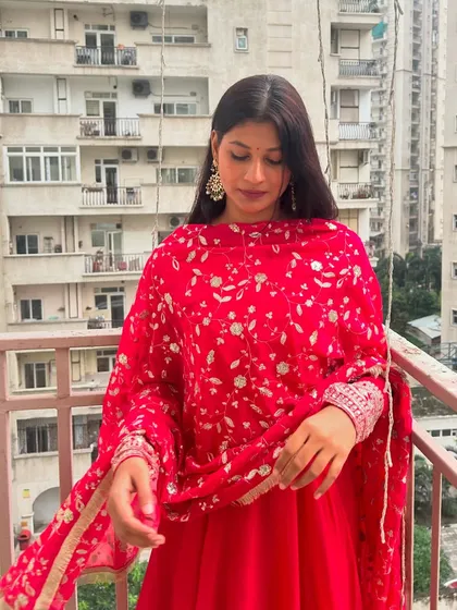The rich pink color of this suit is perfect for the festive season. It's a color that is both joyful and universally flattering.