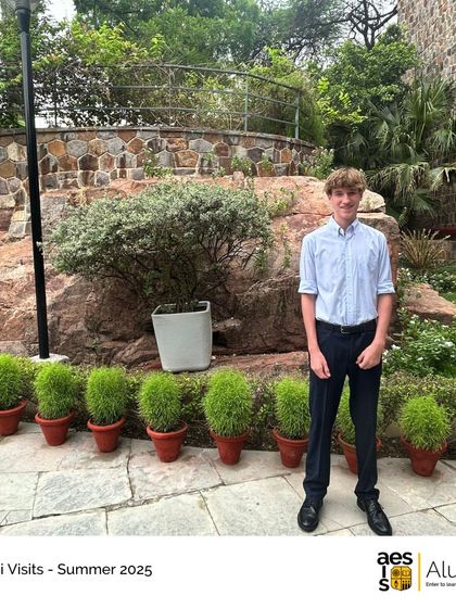 A recent graduate visits the campus, a familiar and welcoming place. We love seeing our alumni return home.