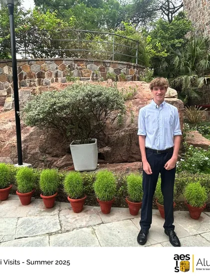 A recent graduate visits the campus, a familiar and welcoming place. We love seeing our alumni return home.
