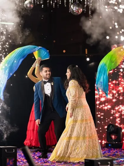 A grand couple entry for the Sangeet, complete with pyrotechnics and dancers. We make sure every entrance is a statement.