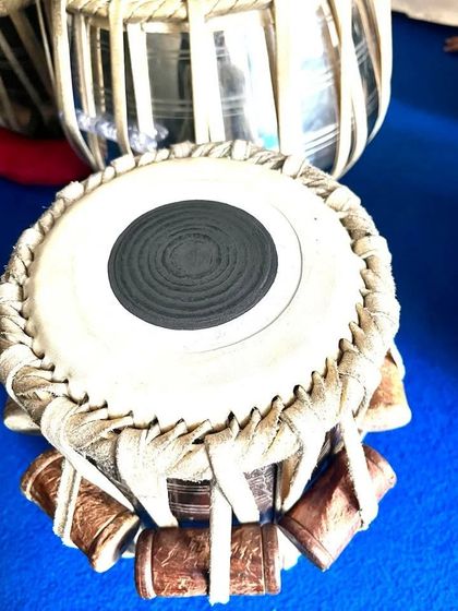 This is a close-up of a delivered D-sharp scale tabla, highlighting its high resonance. We specialize in providing professional-quality tablas and can ship them to you.